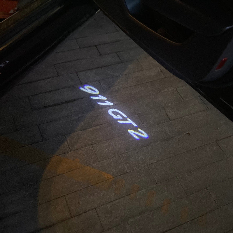 PORSCHE GT LOGO PROJECTOT LIGHTS Nr.8004 (quantità 1 = 2 pellicole logo / 2 luci porta)