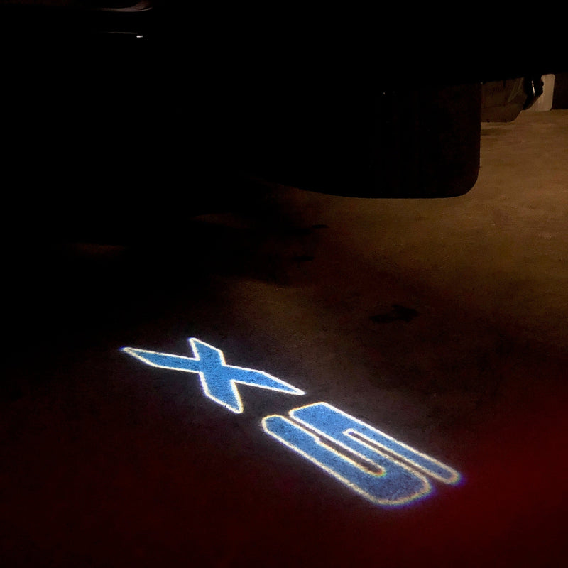 LUCI BMW X5 LOGO PROJECTOT Nr.19 (quantità 1 = 1 set/2 luci porta) 