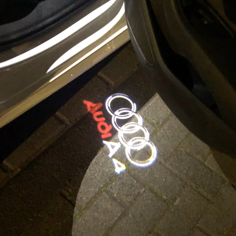 AUDI A4 LOGO PROJECTOT LIGHTS Nr.42  (quantity 1 = 2 Logo Films /2 door lights）