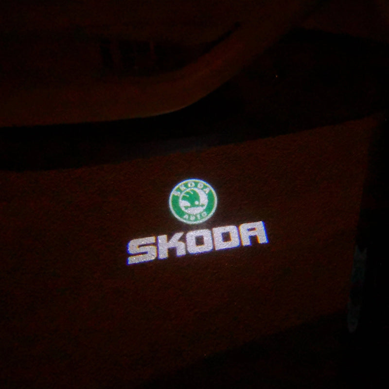 SKODA ORIGINAL LOGO PROJECTOT LIGHTS Nr.14 (quantity  1 =  2 Logo Film /  2 door lights)