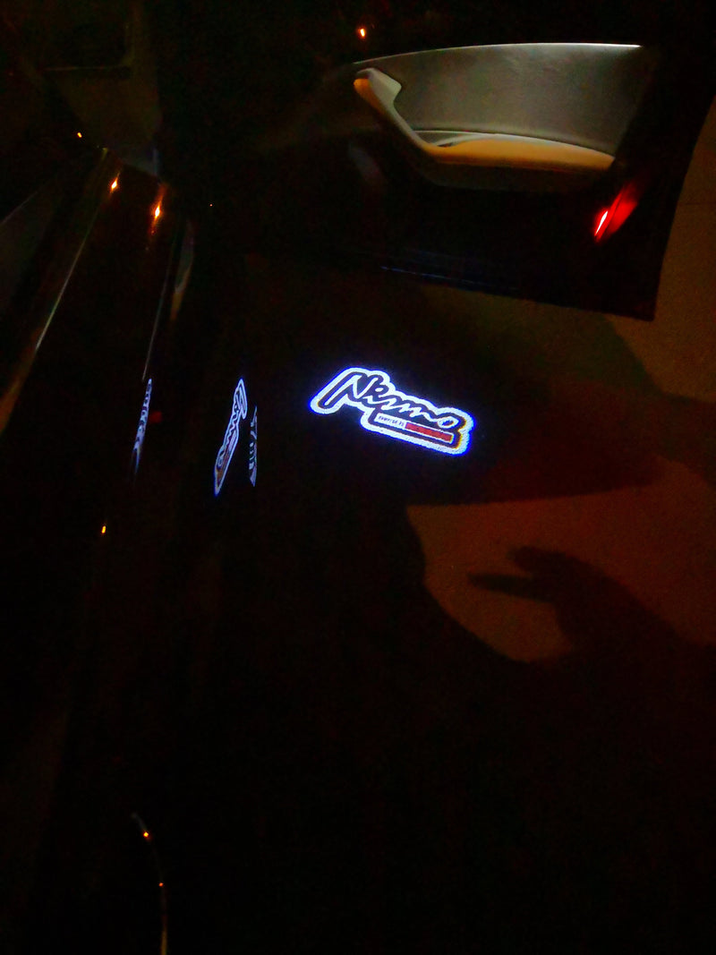 NISMO LOGO PROJECTOT LIGHTS Nr.10 (quantità 1 = 2 pellicole con logo/2 luci per porta）