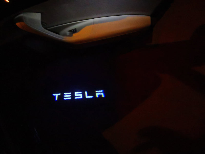 TESLA LOGO PROJECROTR LIGHTS Nr.1517 (quantity  1 =  2 Logo Film /  2 door lights)