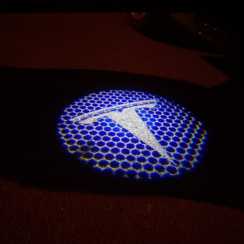 TESLA LOGO PROJECROTR LIGHTS Nr.1509 (Menge 1 = 2 Logofolie / 2 Türleuchten)