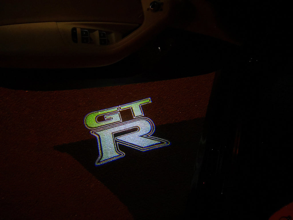 NISSAN GTR R35   LOGO PROJECTOT LIGHTS Nr.07  (quantity 1 = 2 Logo Films /2 door lights）