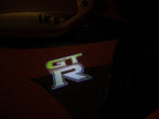 NISSAN GTR R35   LOGO PROJECTOT LIGHTS Nr.07  (quantity 1 = 2 Logo Films /2 door lights）