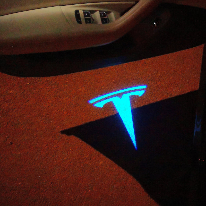 TESLA LOGO PROJECROTR LIGHTS Nr.1523 (quantità 1 = 2 pellicole logo / 2 luci per porta)