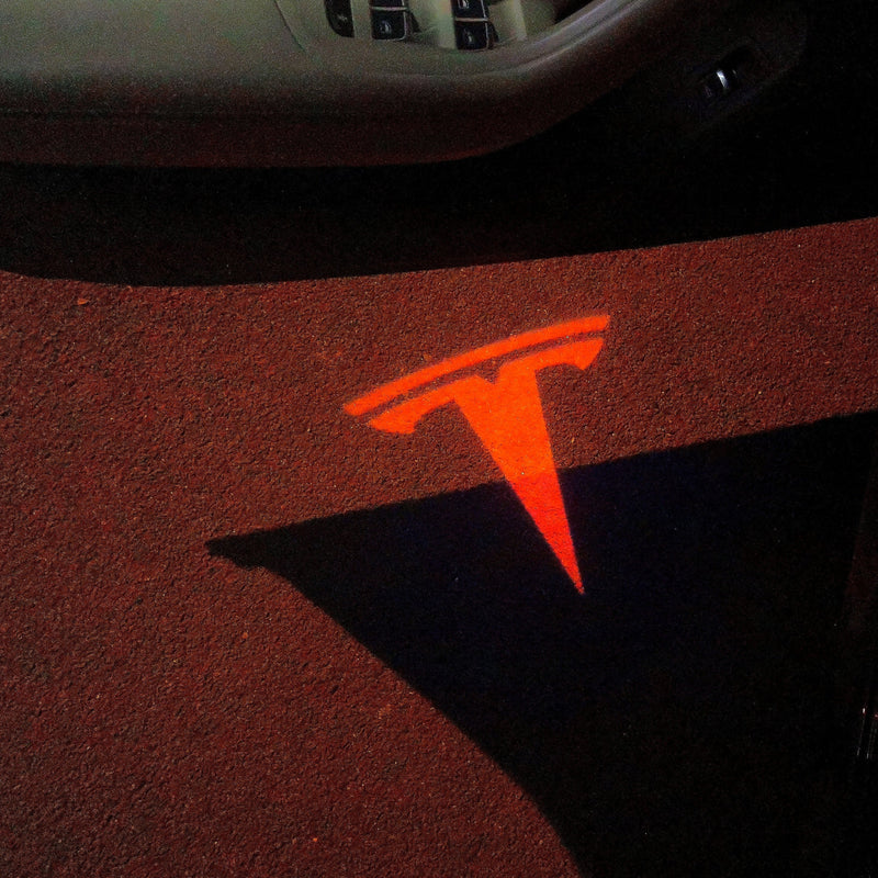 TESLA LOGO PROJECROTR LIGHTS Nr.1522 (quantità 1 = 2 pellicole logo / 2 luci per porta)