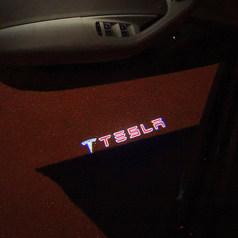 TESLA LOGO PROJECROTR LIGHTS Nr.1508 (quantità 1 = 2 pellicole logo / 2 luci per porta)