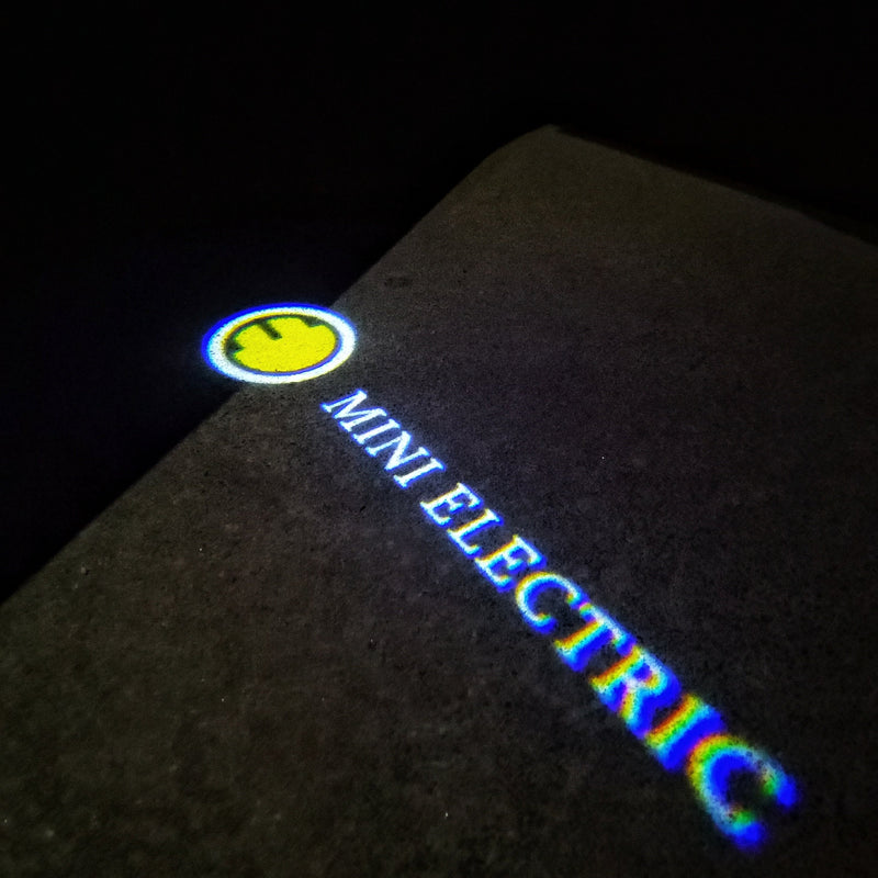 MINI ELECTRIC LOGO PROJECROTR LIGHTS Nr.63 (quantity  1 =  2 Logo Film /  2 door lights)