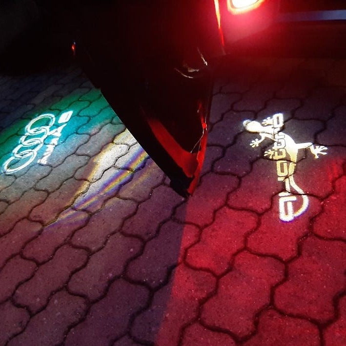 AUDI QUATTRO GECKO  LOGO PROJECTOT LIGHTS Nr.64  (quantity 1 = 2 Logo Films /2 door lights）