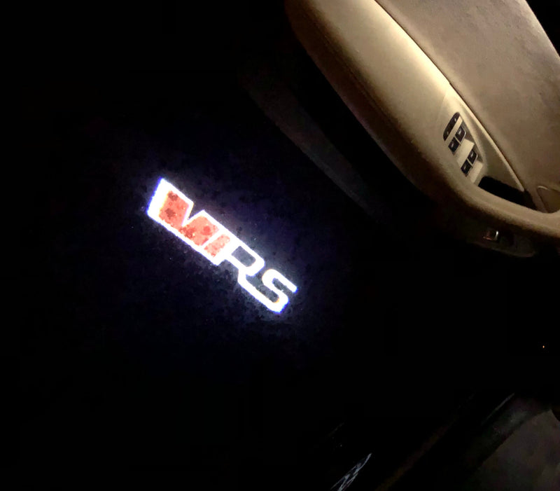 SKODA VRS LOGO PROJECTOT LIGHTS Nr.29 (quantity  1 =  2 Logo Film /  2 door lights)