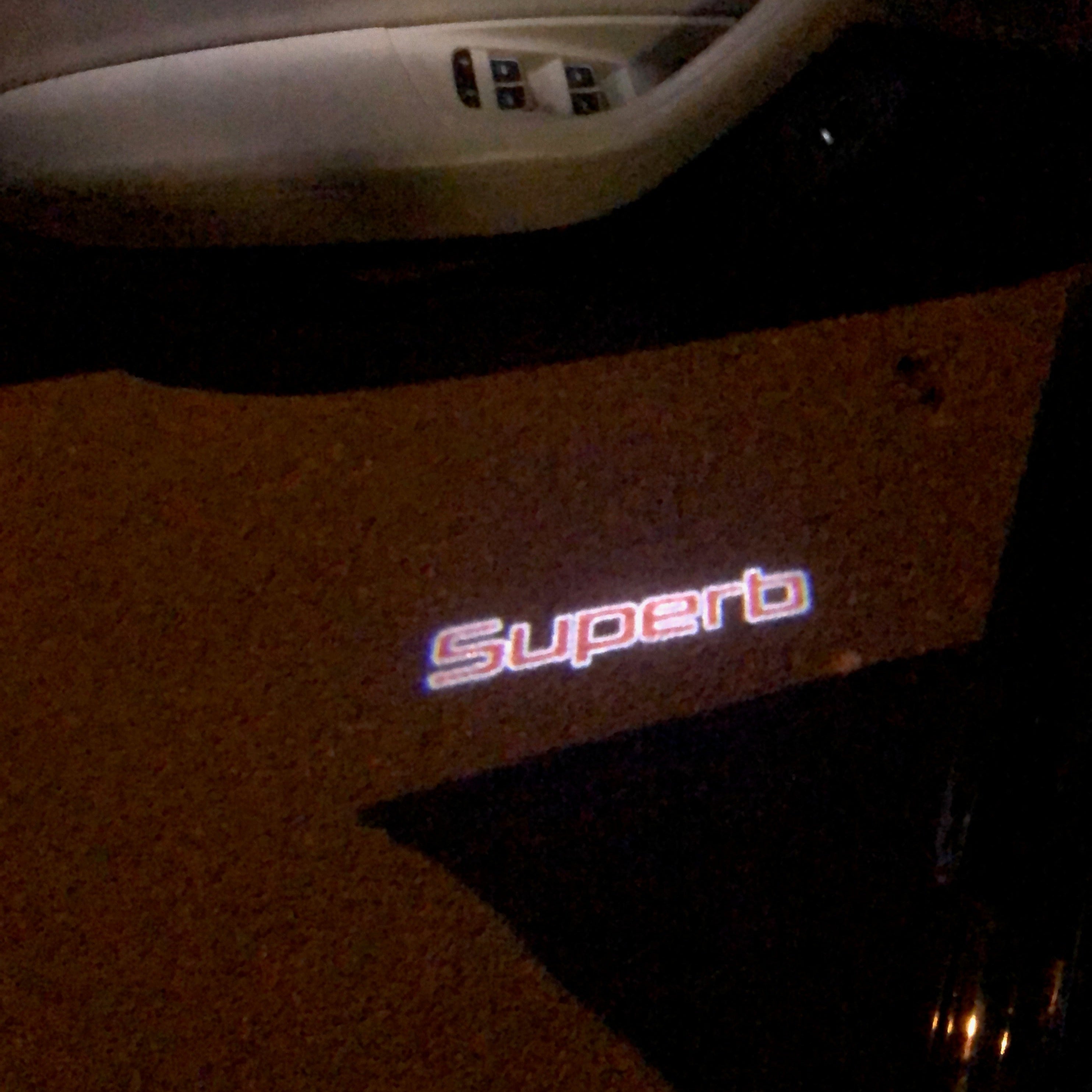 SKODA SUPERB LOGO PROJECTOT LIGHTS Nr.91 (quantity  1 =  2 Logo Film /  2 door lights)