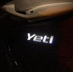 SKODA YETI LOGO PROJECTOT LIGHTS Nr.64 (quantity  1 =  2 Logo Film /  2 door lights)