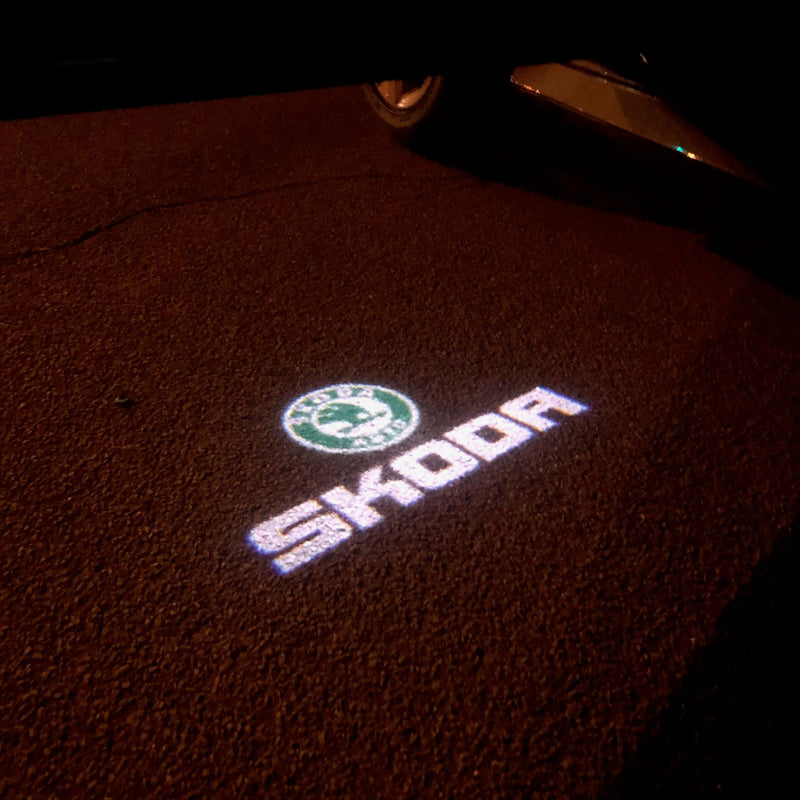 SKODA ORIGINAL LOGO PROJECTOT LIGHTS Nr.14 (quantity  1 =  2 Logo Film /  2 door lights)