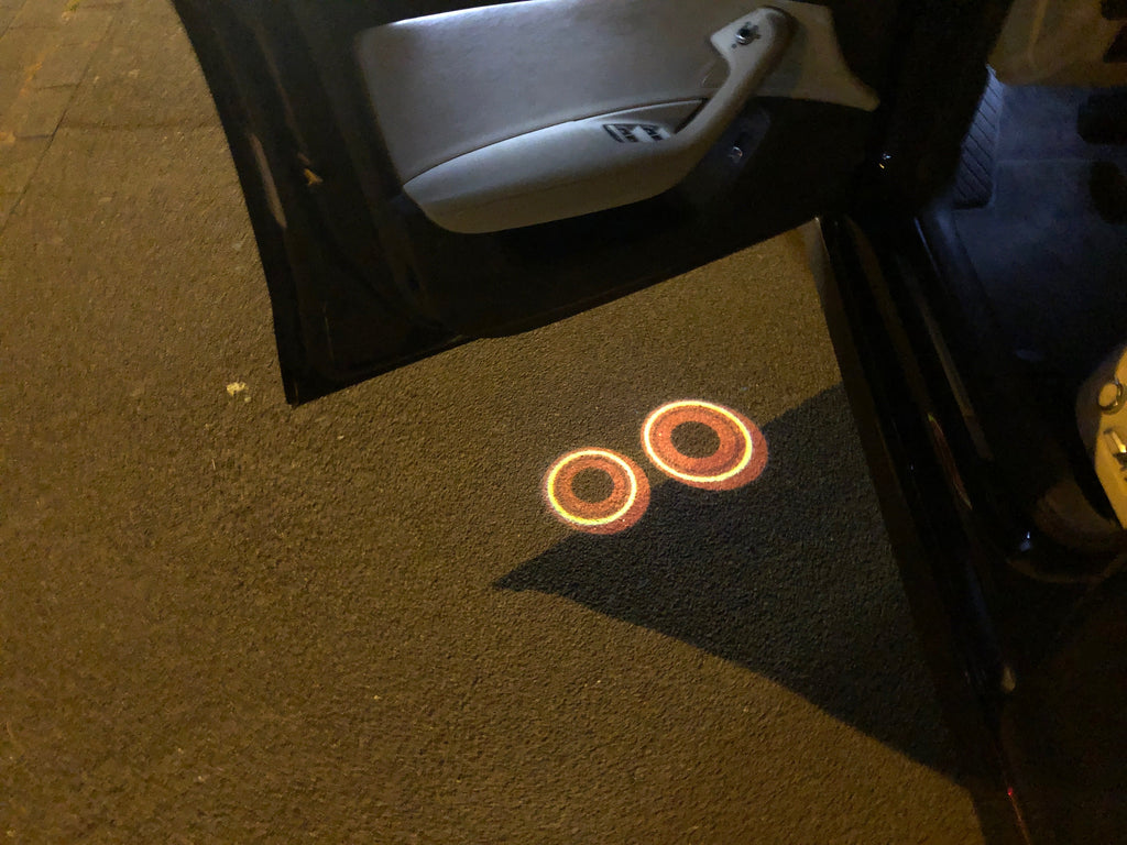 NISSAN GTR R35  LOGO PROJECTOT LIGHTS Nr.09  (quantity 1 = 2 Logo Films /2 door lights）