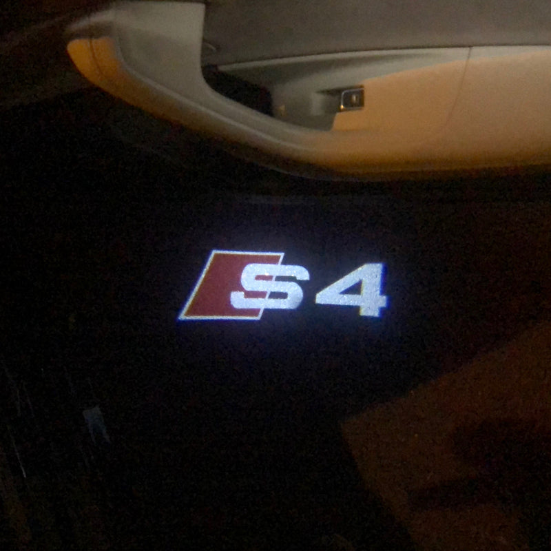 AUDI S4 LOGO PROJECTOT LIGHTS Nr.25 (quantità 1 = 2 pellicole logo /2 luci porta）