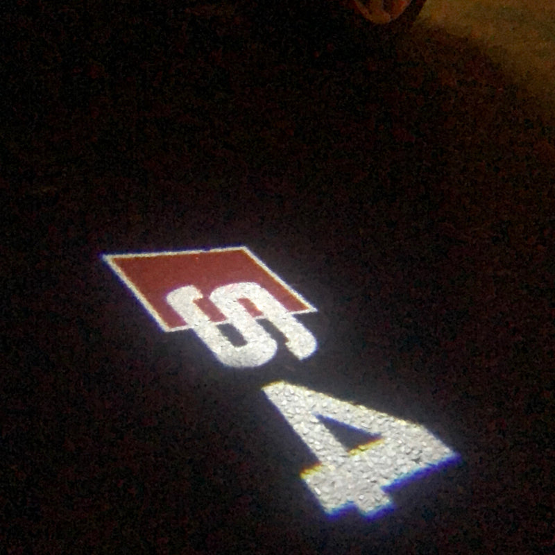 AUDI S4 LOGO PROJECTOT LIGHTS Nr.25 (quantità 1 = 2 pellicole logo /2 luci porta）