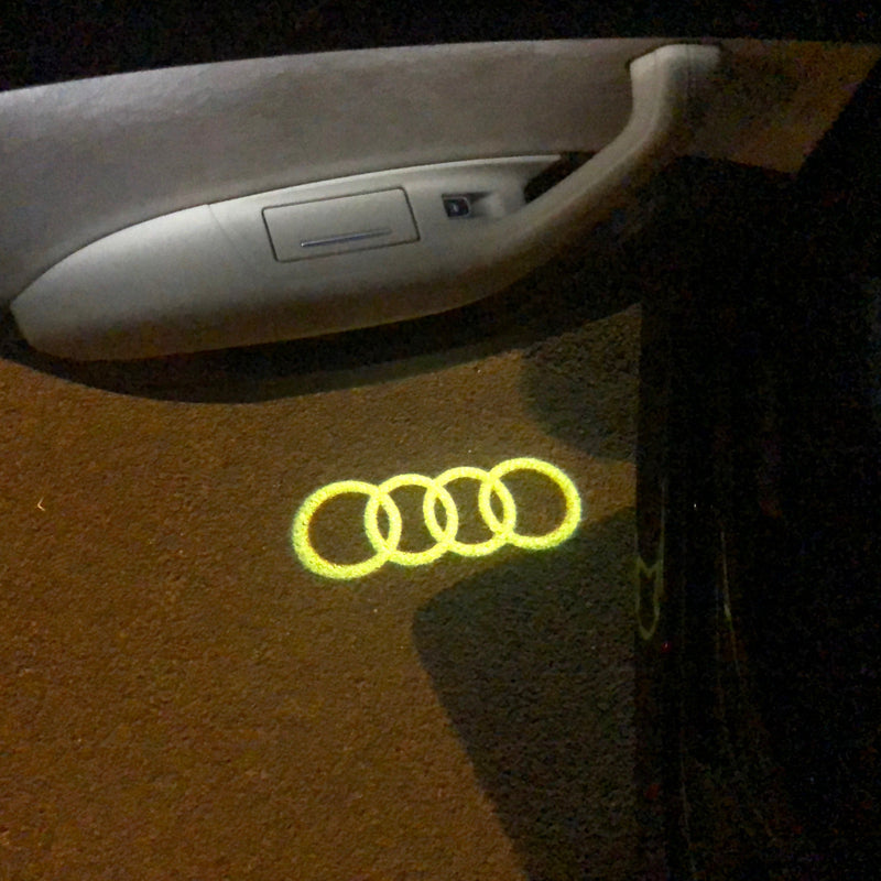 AUDI 4 RINGS  LOGO PROJECTOT LIGHTS Nr.144  (quantity 1 = 2 Logo Films /2 door lights）