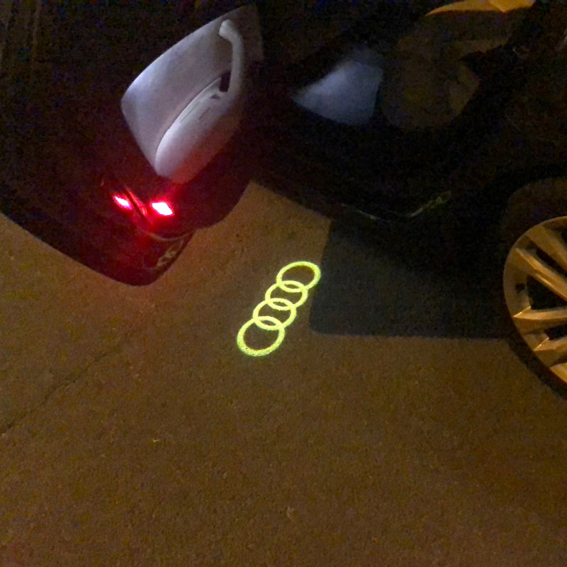 AUDI 4 RINGS  LOGO PROJECTOT LIGHTS Nr.144  (quantity 1 = 2 Logo Films /2 door lights）