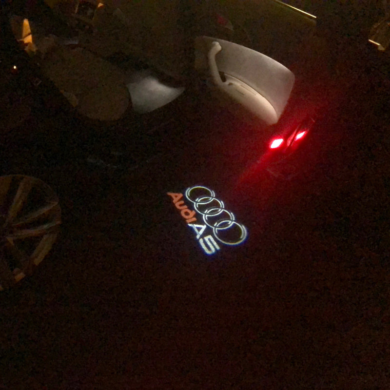 AUDI A5 LOGO PROJECTOT LIGHTS Nr.43 (quantità 1 = 2 pellicole logo /2 luci porta） 