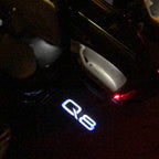 AUDI Q8 LOGO PROJECTOT LIGHTS Nr.102   (quantity 1 = 2 Logo Films /2 door lights）