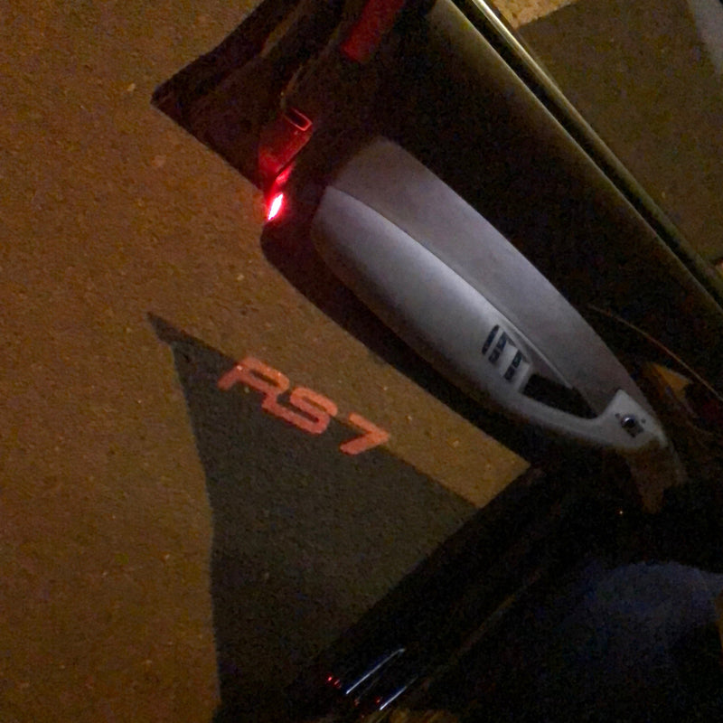 AUDI RS7 LOGO PROJECTOT LIGHTS Nr.142 (Menge 1 = 2 Logofolien /2 Türleuchten） 