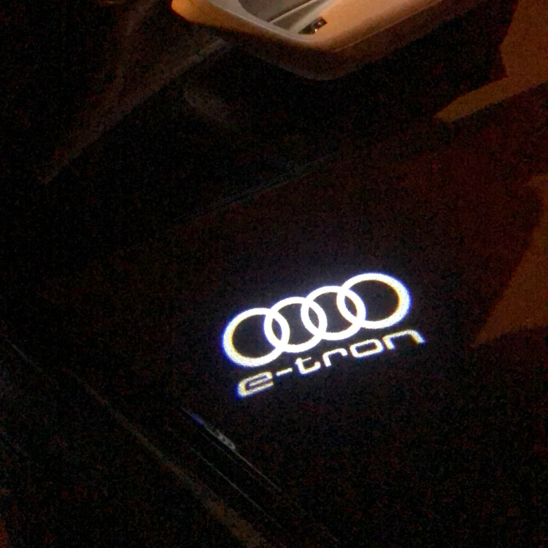 AUDI E-TRON LOGO PROJECTOT LIGHTS Nr.16 (quantità 1 = 2 pellicole logo /2 luci porta） 