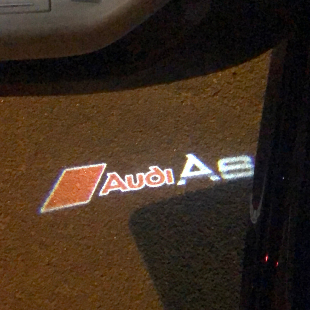AUDI A6 LOGO PROJECTOT LIGHTS Nr.40  (quantity 1 = 2 Logo Films /2 door lights）