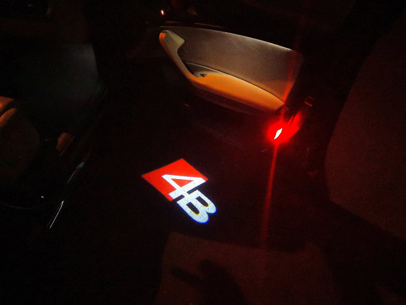 AUDI 4B LOGO PROJECTOT LIGHTS Nr.115 (quantità 1 = 1 set/2 luci porta)