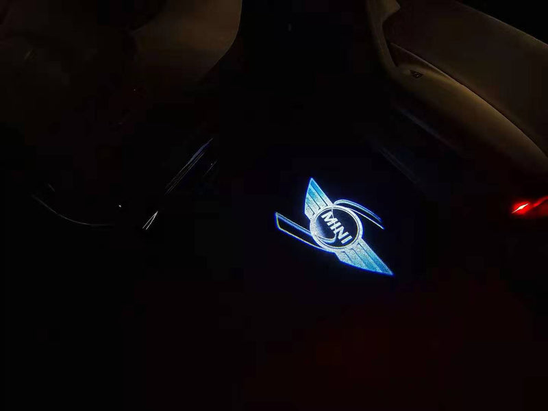 MINI S LOGO PROJECROTR LIGHTS Nr.52 (quantità 1 = 2 pellicole logo / 2 luci porta) 