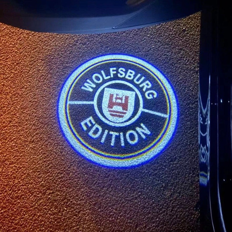 Volkswagen Luci porta WOLFSBURG Logo Nr. 165 (quantità 1 = 2 pellicole logo / 2 luci porta)